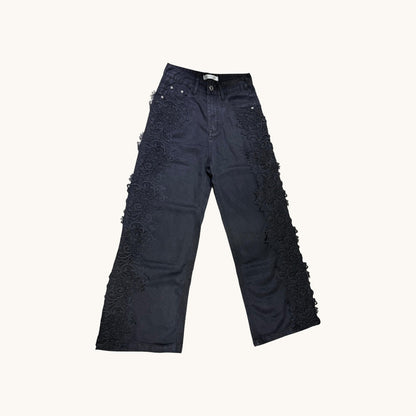 Pantalones con detalle floreado al lateral